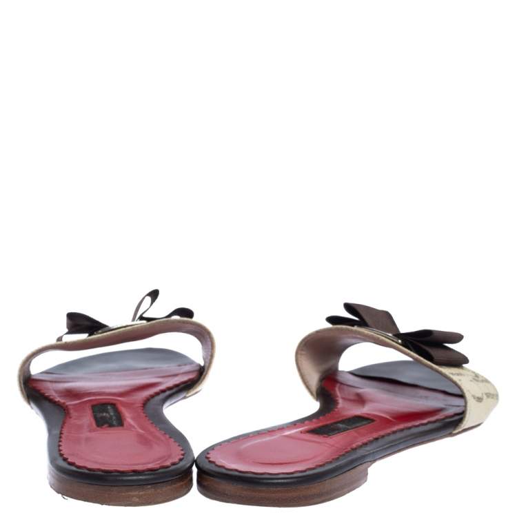 Pre Owned Carolina Herrera Brown CH Logo Coated Canvas Bow Detail Flat Slides Size 38