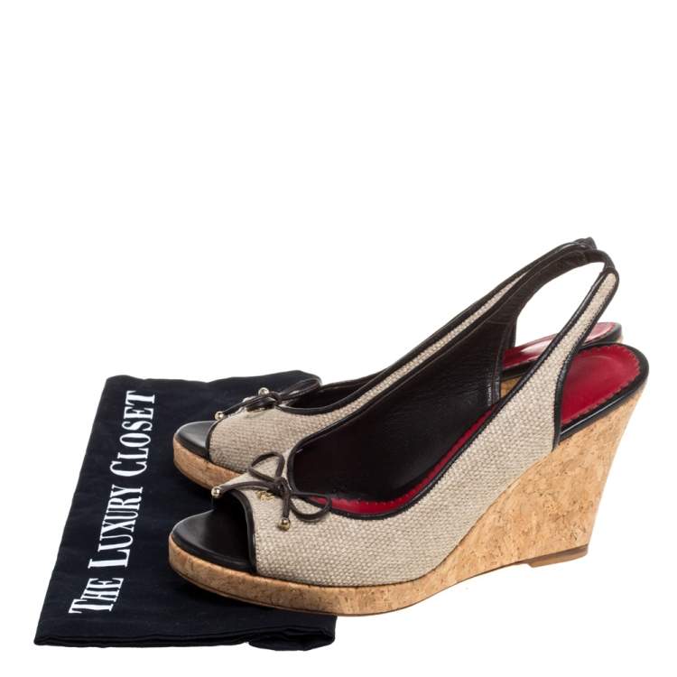 Pre Owned CH Carolina Herrera Beige Canvas And Leather Trim Bow Cork Wedge Slingback Sandals Size 38