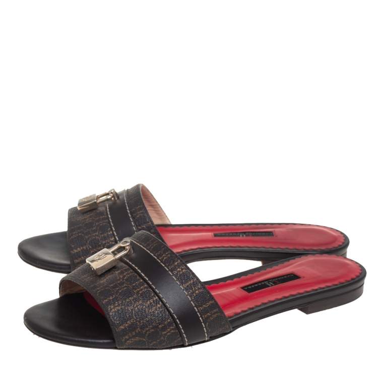 Pre Owned Carolina Herrera Brown Signature Canvas Lock Flat Slides Size 39