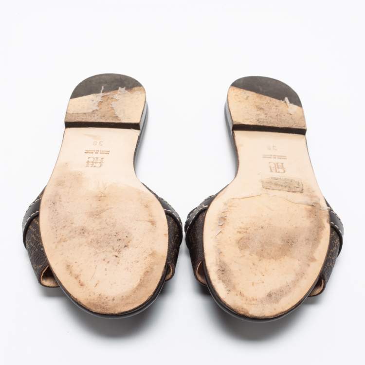Pre Owned CH Carolina Herrera Dark Brown Monogram Embossed Leather Traveller Locked Flat Slides Size 38