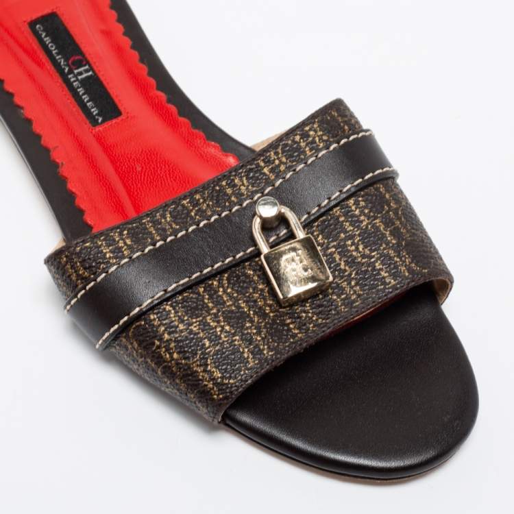Pre Owned CH Carolina Herrera Dark Brown Monogram Embossed Leather Traveller Locked Flat Slides Size 38