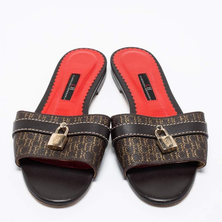 Pre Owned CH Carolina Herrera Dark Brown Monogram Embossed Leather Traveller Locked Flat Slides Size 38