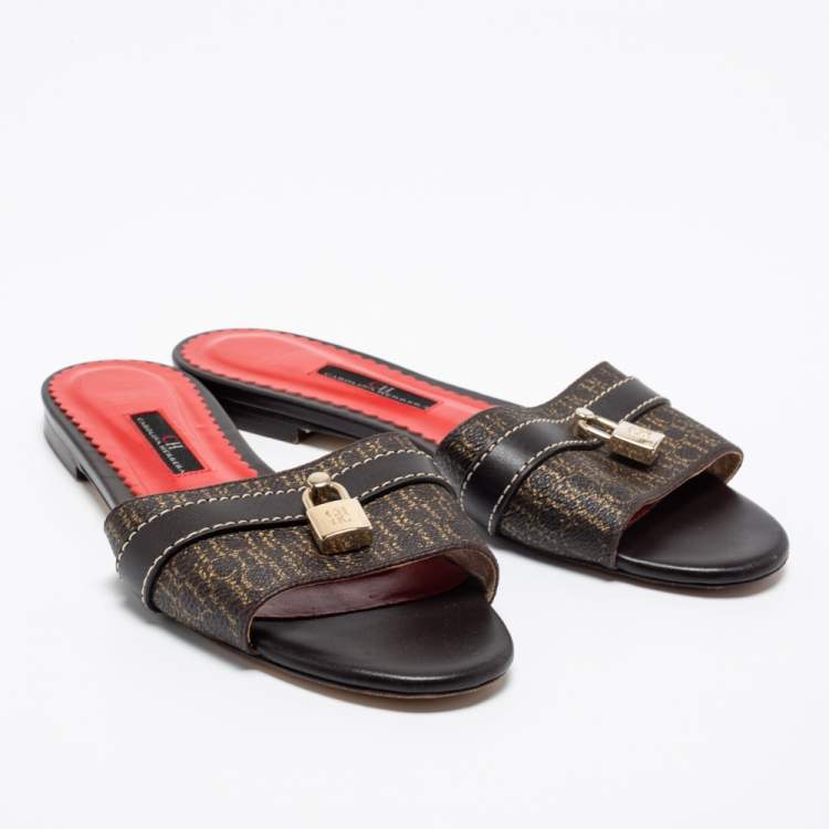 Pre Owned CH Carolina Herrera Dark Brown Monogram Embossed Leather Traveller Locked Flat Slides Size 38