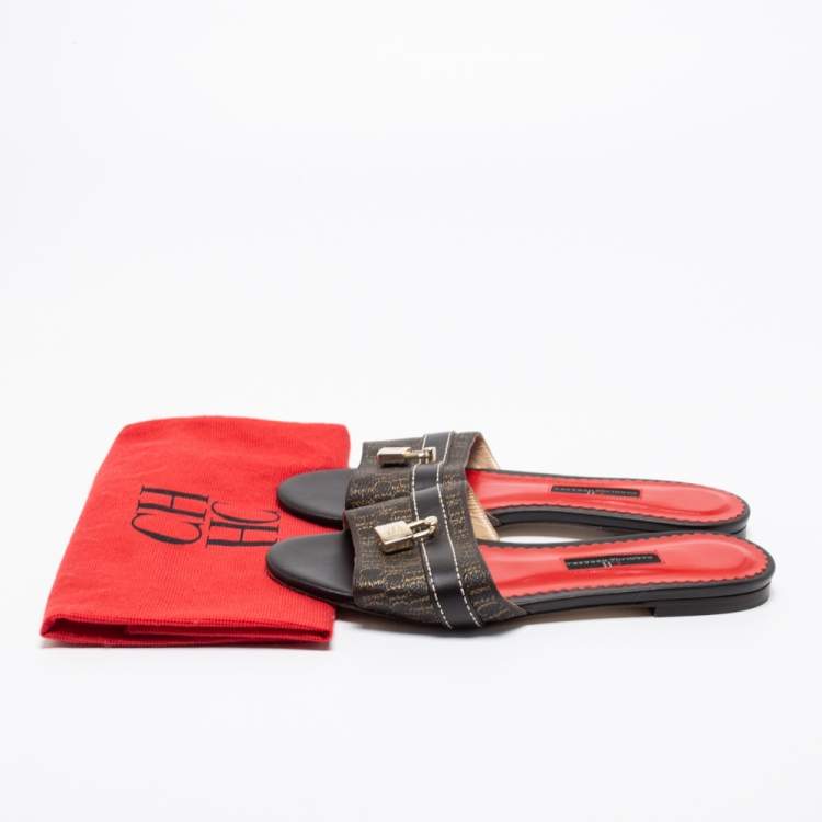 Pre Owned CH Carolina Herrera Dark Brown Monogram Embossed Leather Traveller Locked Flat Slides Size 38