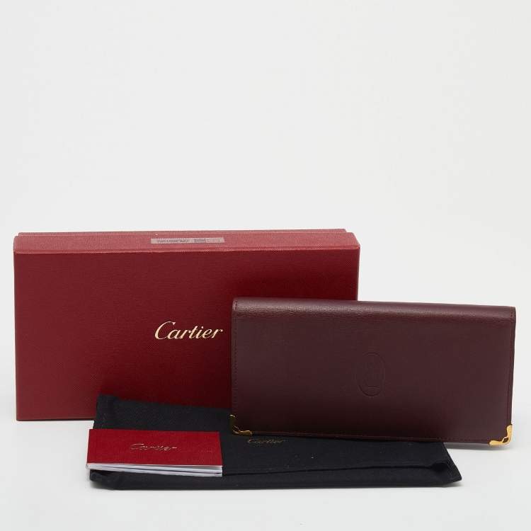 Pre Owned Cartier Burgundy Leather Must de Cartier Bifold Long Wallet
