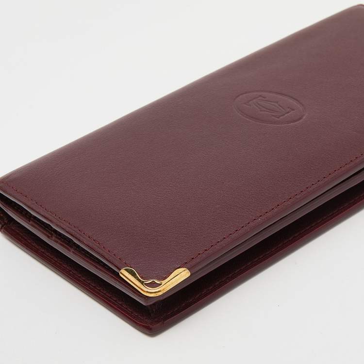 Pre Owned Cartier Burgundy Leather Must de Cartier Bifold Long Wallet