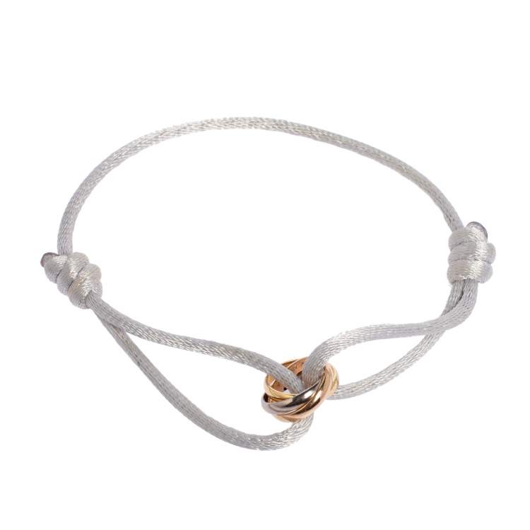 Pre Owned Cartier Trinity de Cartier 18K Three Tone Gold Adjustable White Cord Bracelet