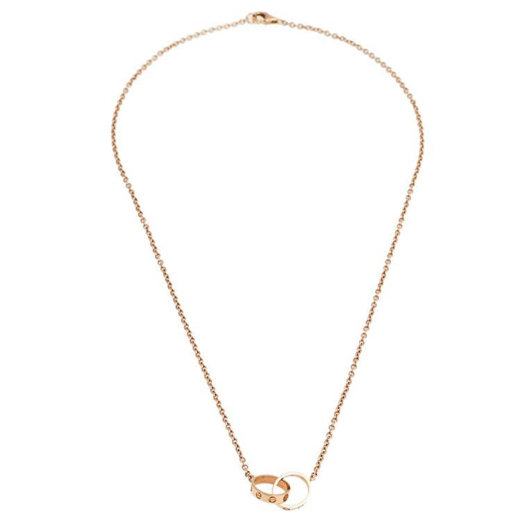 Pre Owned Cartier Love Interlocking Loop 18K Rose Gold Pendant Necklace