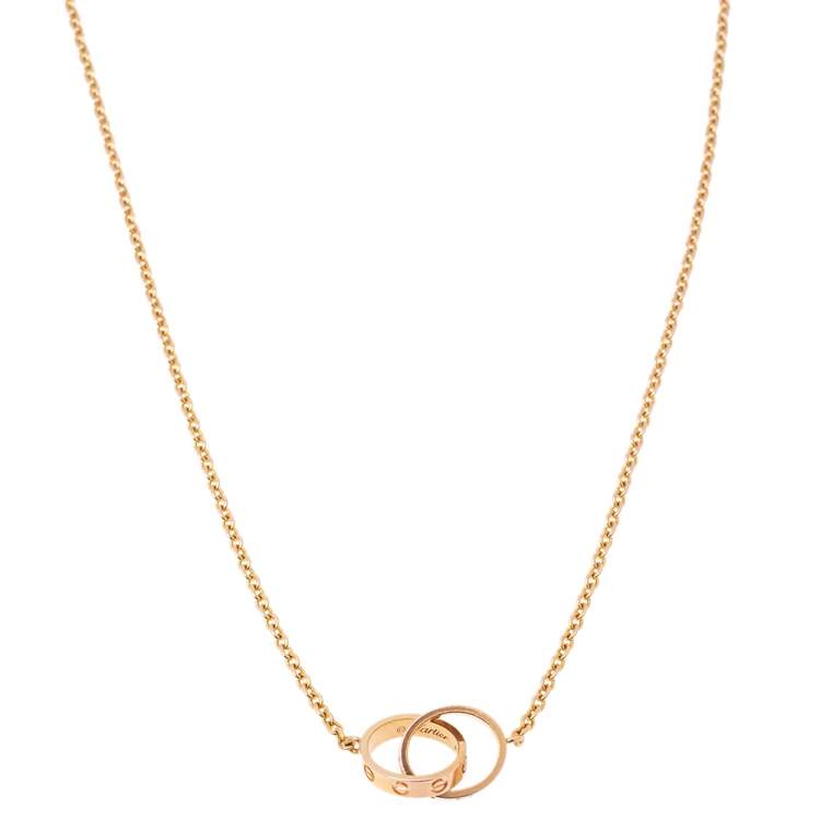Pre Owned Cartier Love Interlocking Loop 18K Rose Gold Pendant Necklace