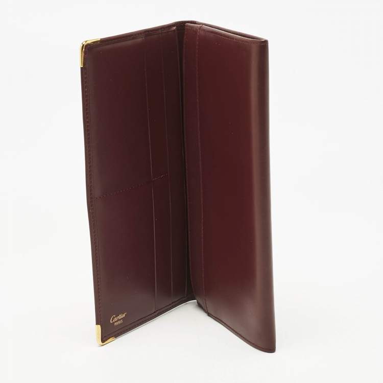 مملوكة مسبقًا Cartier Burgundy Leather Must De Cartier Bi Fold Long Wallet