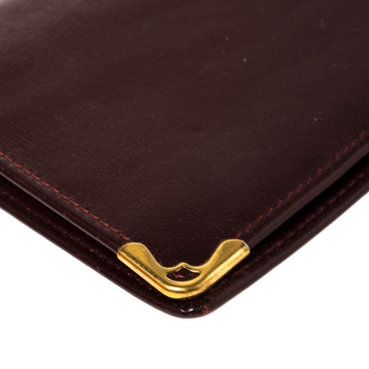 Pre Owned Cartier Burgundy Leather Must de Cartier Bifold Long Wallet