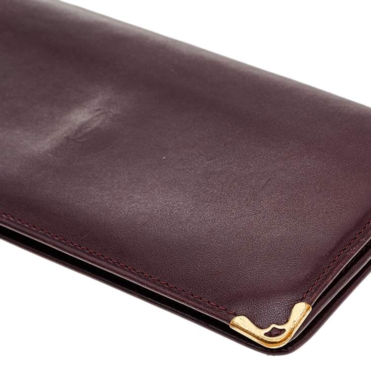 Pre Owned Cartier Burgundy Leather Must de Cartier Bifold Long Wallet