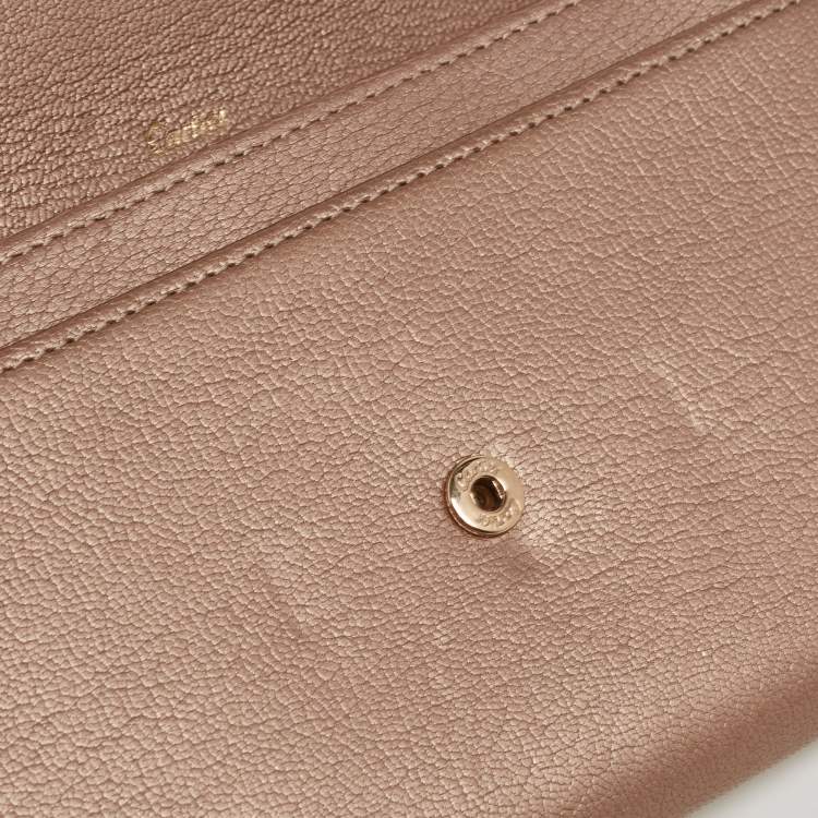 مملوكة مسبقًا Cartier Metallic Beige Leather Love Flap Continental Wallet
