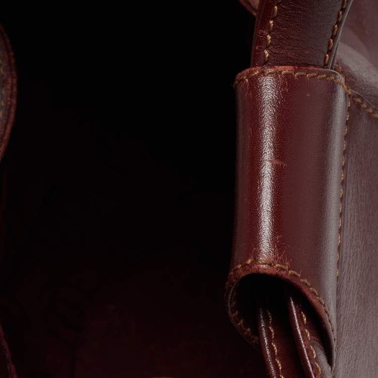 Pre Owned Cartier Burgundy Leather Must de Cartier Bucket Bag