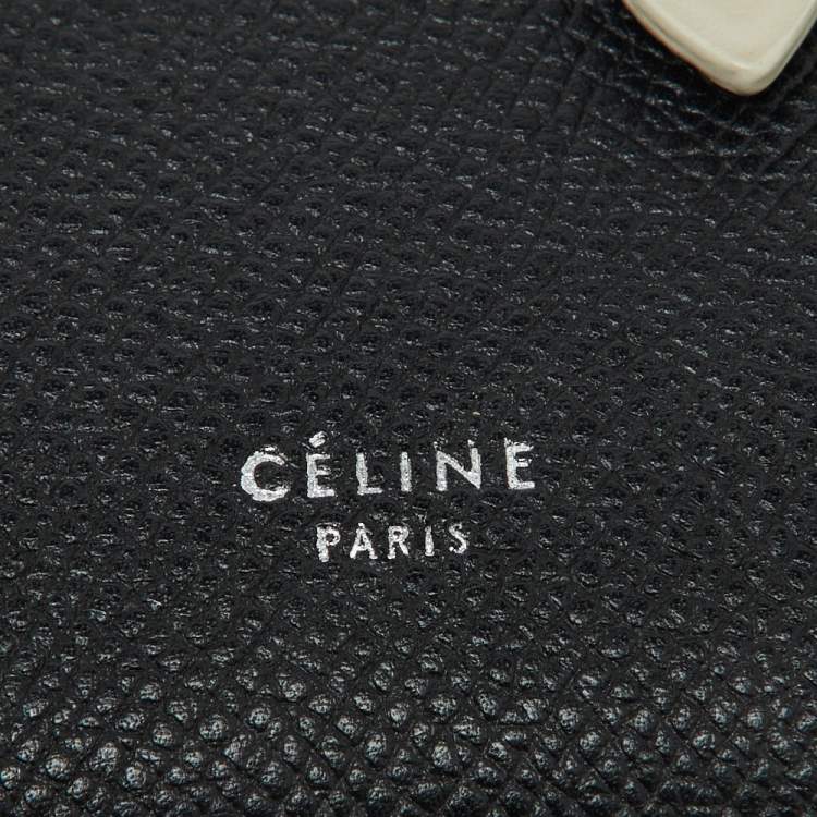 Pre Owned Celine Black/Off White Grained Leather Multifunction Strap Wallet