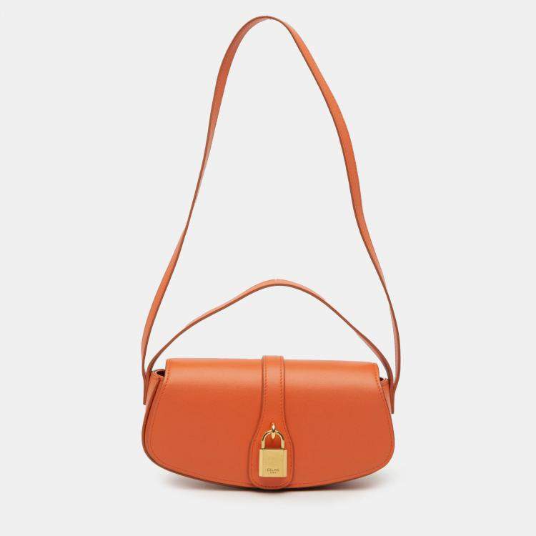 Pre Owned Celine Orange Smooth Calfskin Tabou Clutch on Strap