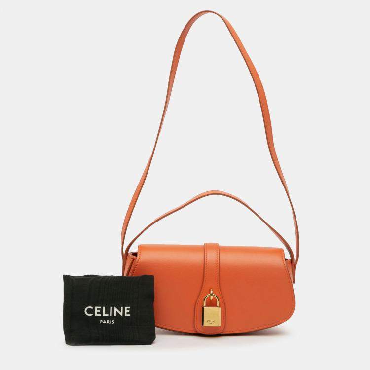 Pre Owned Celine Orange Smooth Calfskin Tabou Clutch on Strap