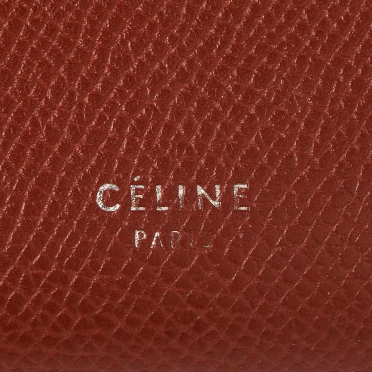 Pre Owned Celine Copper Brown/Pink Grained Leather Multifunction Strap Wallet
