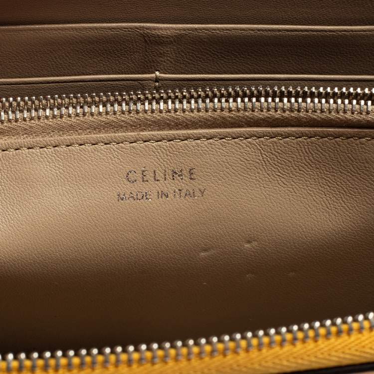 مملوكة مسبقًا Celine Mustard Yellow Leather Zip Around Wallet 