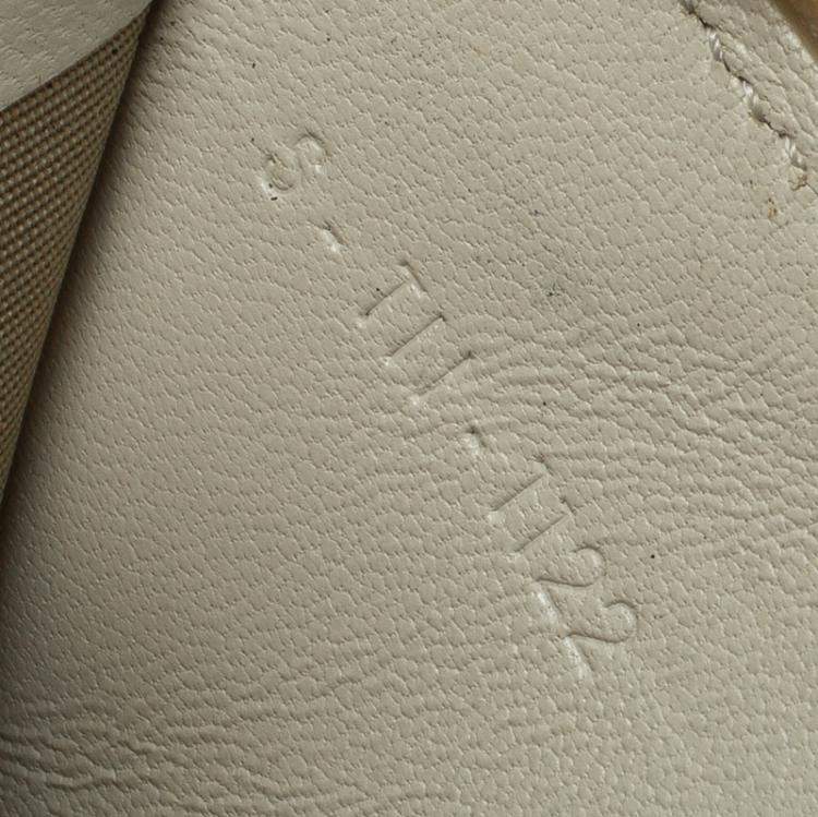 Pre Owned Celine Off White Leather Holographic Zip Up Wallet