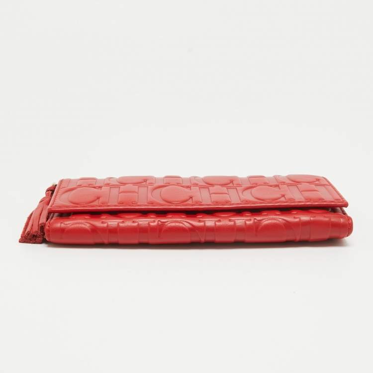 Pre Owned CH Carolina Herrera Red Monogram Embossed Leather Trifold Wallet