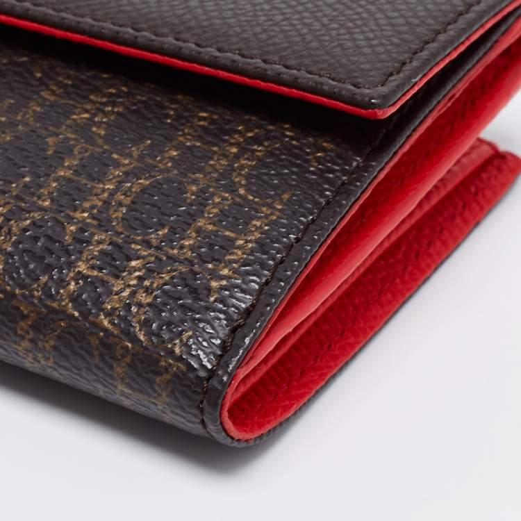 Pre Owned CH Carolina Herrera Brown Monogram Embossed Coated Canvas and Leather French Wallet