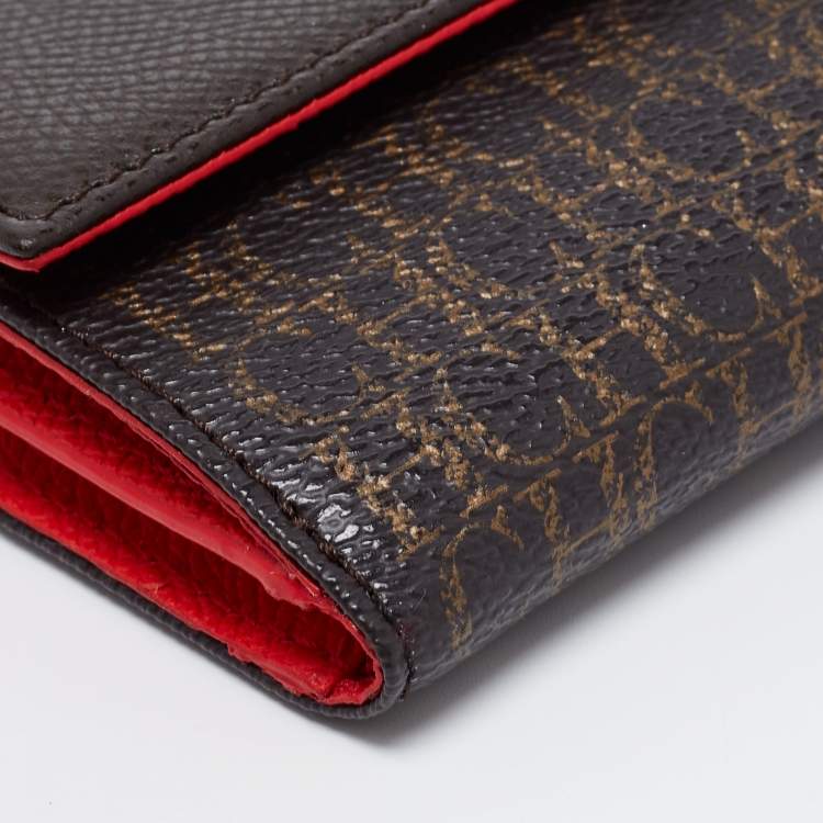 Pre Owned CH Carolina Herrera Brown Monogram Embossed Coated Canvas and Leather French Wallet