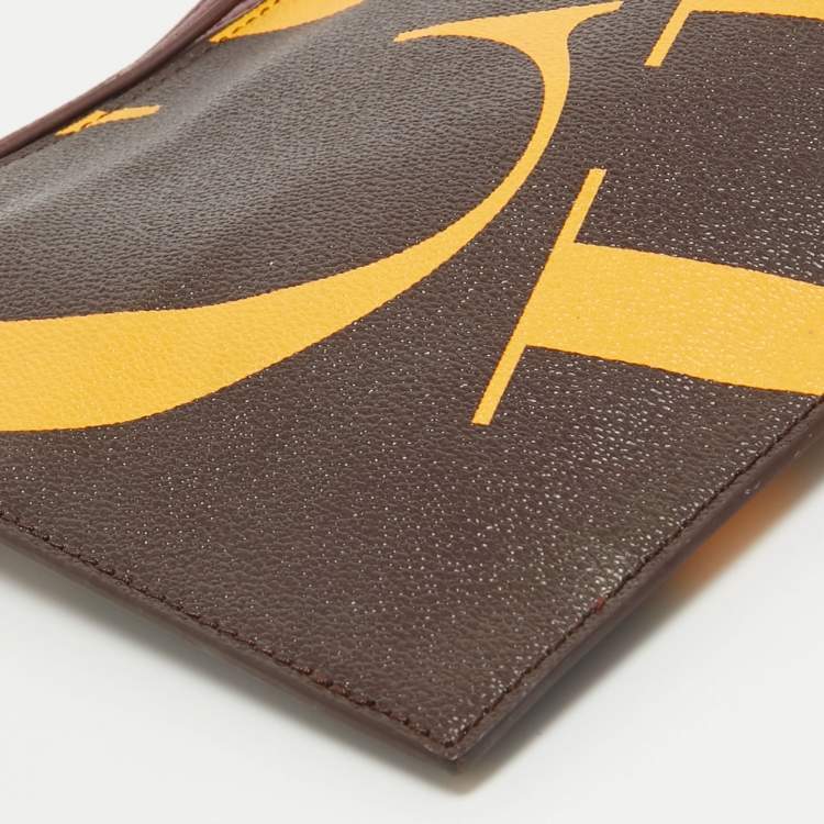 Pre Owned CH Carolina Herrera Brown/Yellow Monogram Coated Canvas Wristlet Clutch