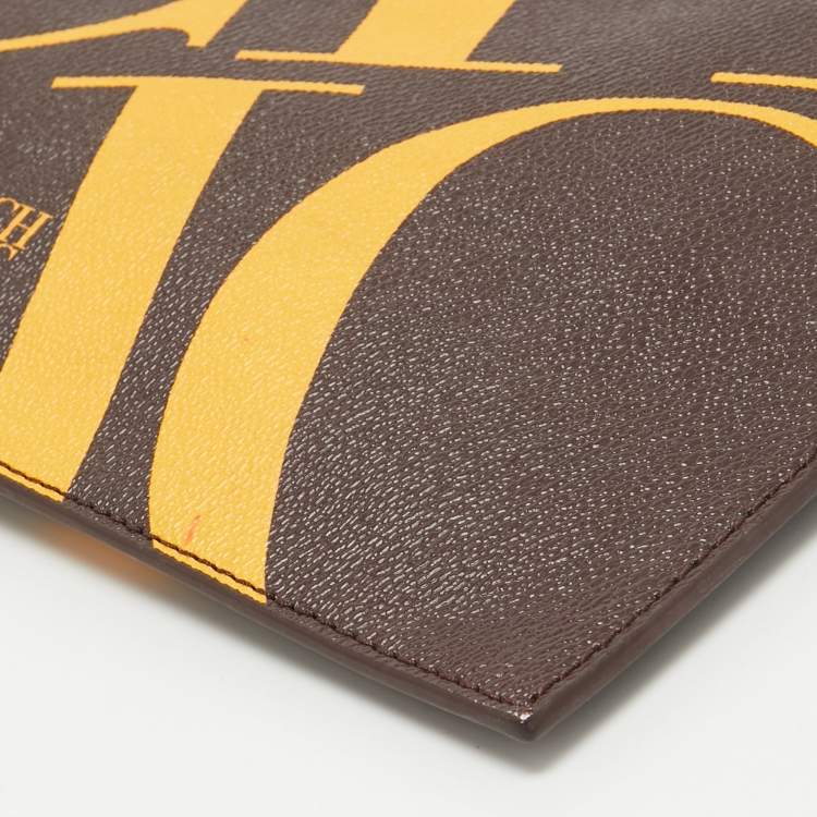 Pre Owned CH Carolina Herrera Brown/Yellow Monogram Coated Canvas Wristlet Clutch