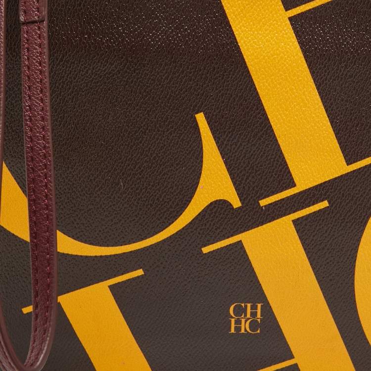 Pre Owned CH Carolina Herrera Brown/Yellow Monogram Coated Canvas Wristlet Clutch