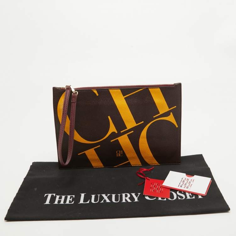 Pre Owned CH Carolina Herrera Brown/Yellow Monogram Coated Canvas Wristlet Clutch