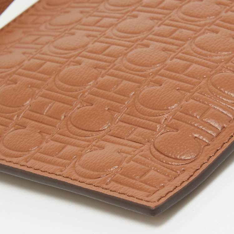 Pre Owned CH Carolina Herrera Brown Monogram Embossed Leather Wrsitlet Clutch