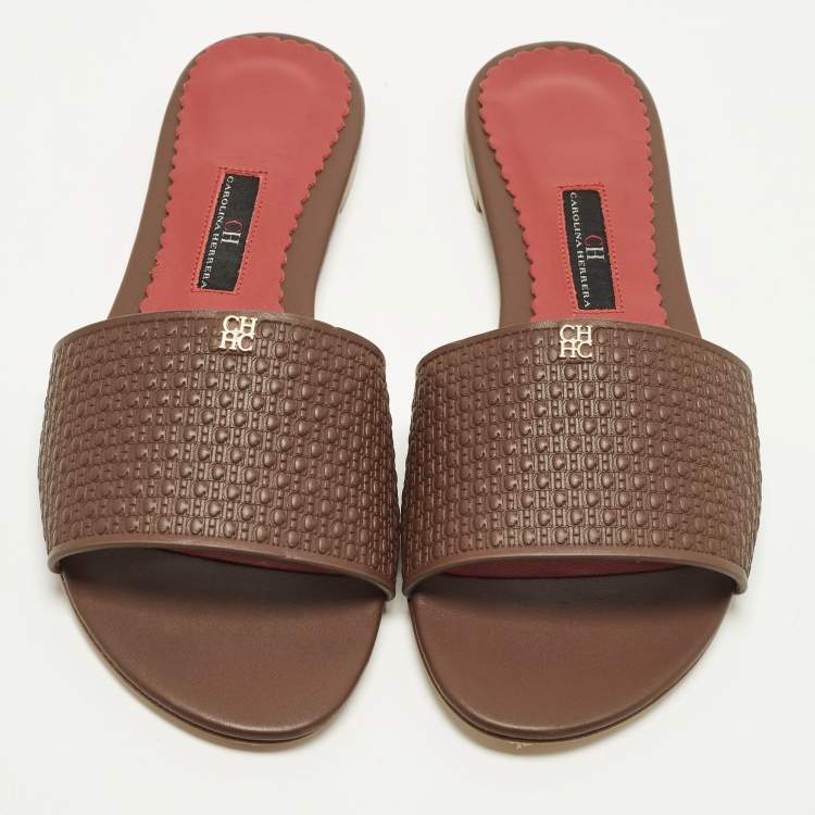 Pre Owned CH Carolina Herrera Size 38 Burgundy Monogram Embossed Leather Flat Slide Sandals