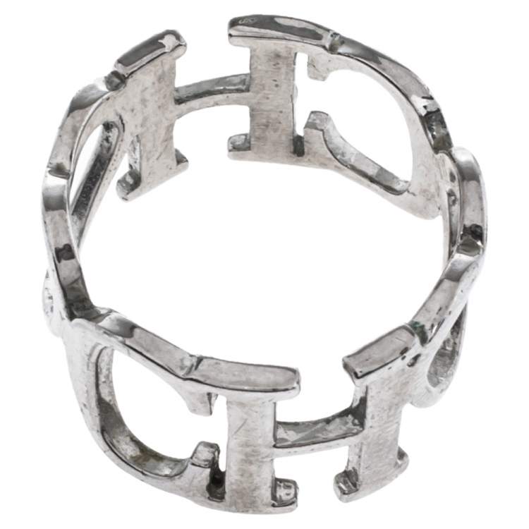 Pre Owned Carolina Herrera Logo & Heart Silver Tone Band Ring Size EU 56