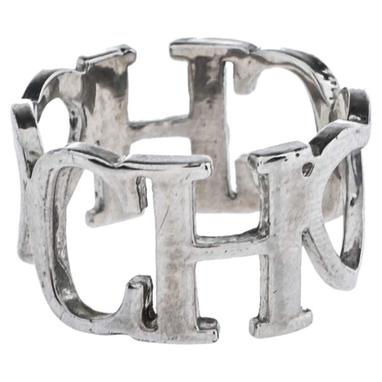 Pre Owned Carolina Herrera Logo & Heart Silver Tone Band Ring Size EU 56
