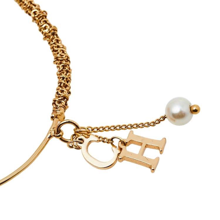 Pre Owned CH Carolina Herrera Logo and Faux Pearl Charm Gold Tone Bracelet 