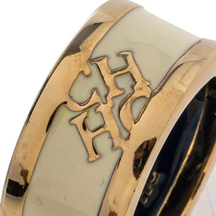 Pre Owned Carolina Herrera Cream Enamel Logo Gold Tone Band Ring Size EU 54.5