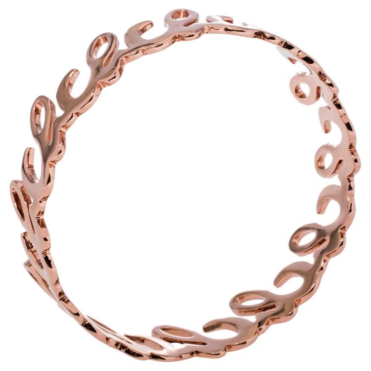 Pre Owned CH Carolina Herrera Rose Gold Tone Logo Bangle Bracelet 
