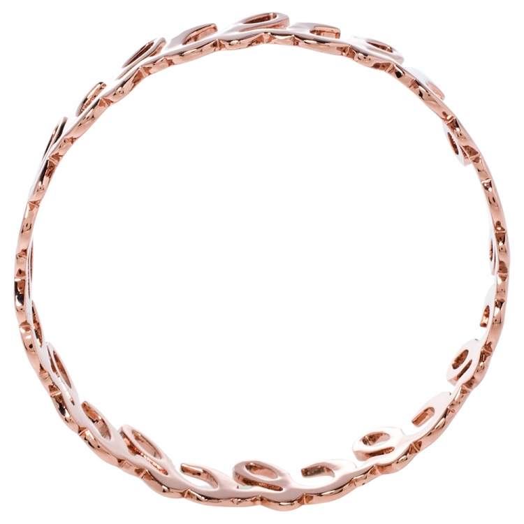 Pre Owned CH Carolina Herrera Rose Gold Tone Logo Bangle Bracelet 