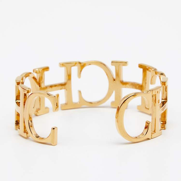 Pre Owned CH Carolina Herrera Gold Tone Between the Line Open Cuff Bracelet