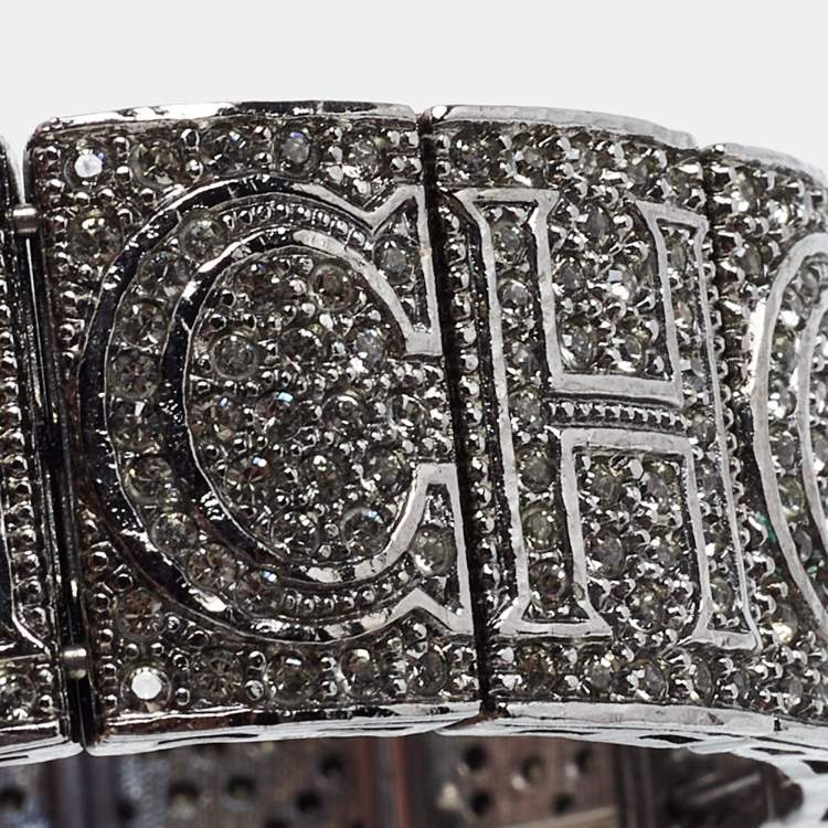 Pre Owned CH Carolina Herrera Crystal Logo Gunmetal Tone Open Cuff Bracelet
