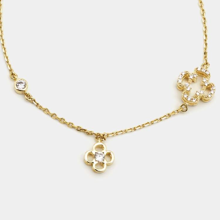 Pre Owned CH Carolina Herrera Gold Tone Petite Rosetta Insignia Bracelet & Earrings Set