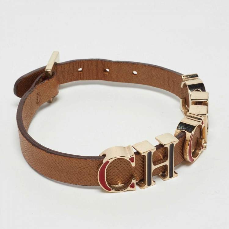 Pre Owned CH Carolina Herrera Brown Enameled CH Logo Brown Leather Gold Tone Bracelet