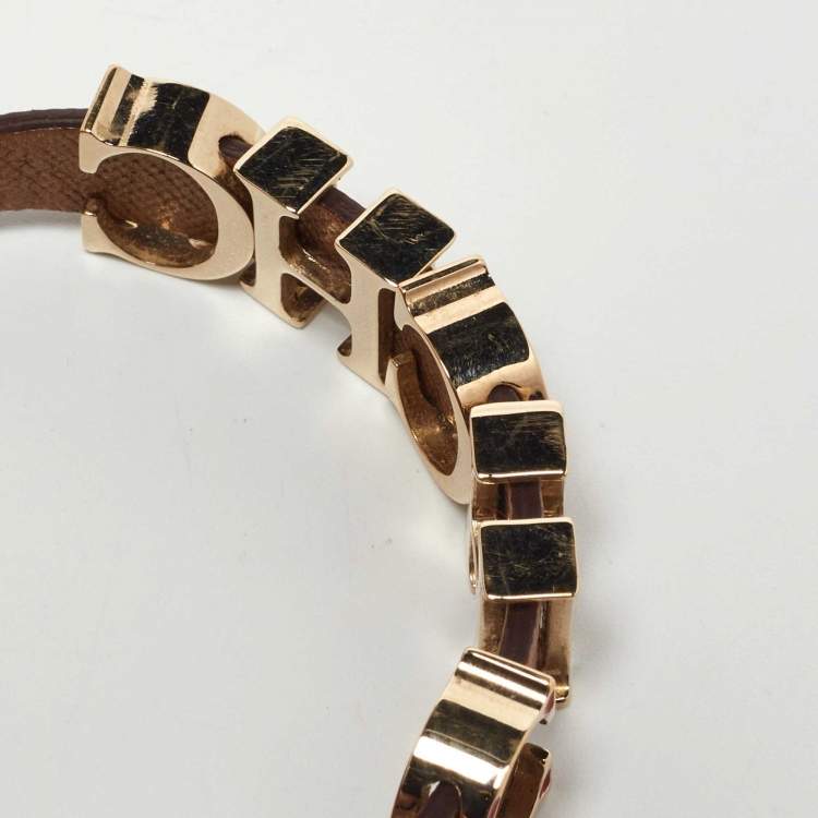 Pre Owned CH Carolina Herrera Brown Enameled CH Logo Brown Leather Gold Tone Bracelet