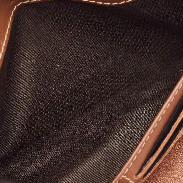 Pre Owned CH Carolina Herrera Brown Monogram Embossed Leather Trifold Continental Wallet