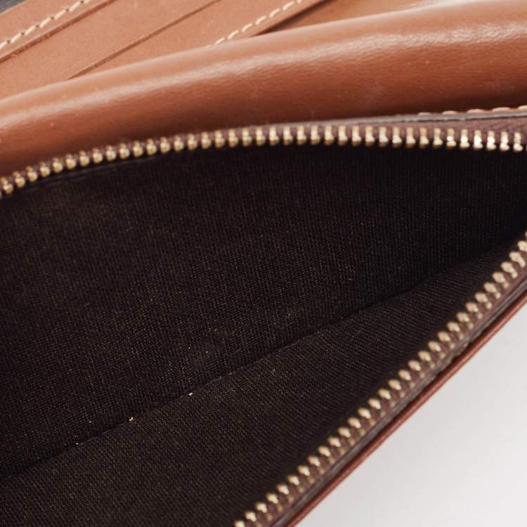 Pre Owned CH Carolina Herrera Brown Monogram Embossed Leather Trifold Continental Wallet