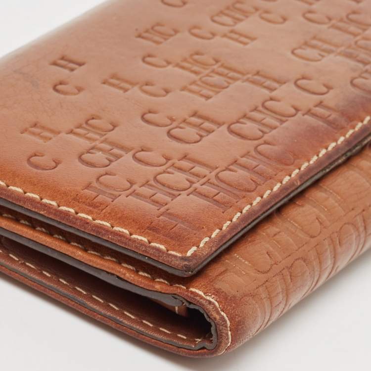 Pre Owned CH Carolina Herrera Brown Monogram Embossed Leather Trifold Continental Wallet