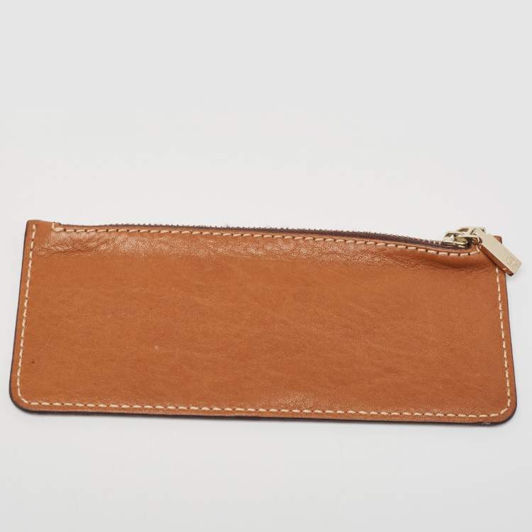Pre Owned CH Carolina Herrera Brown Monogram Embossed Leather Trifold Continental Wallet