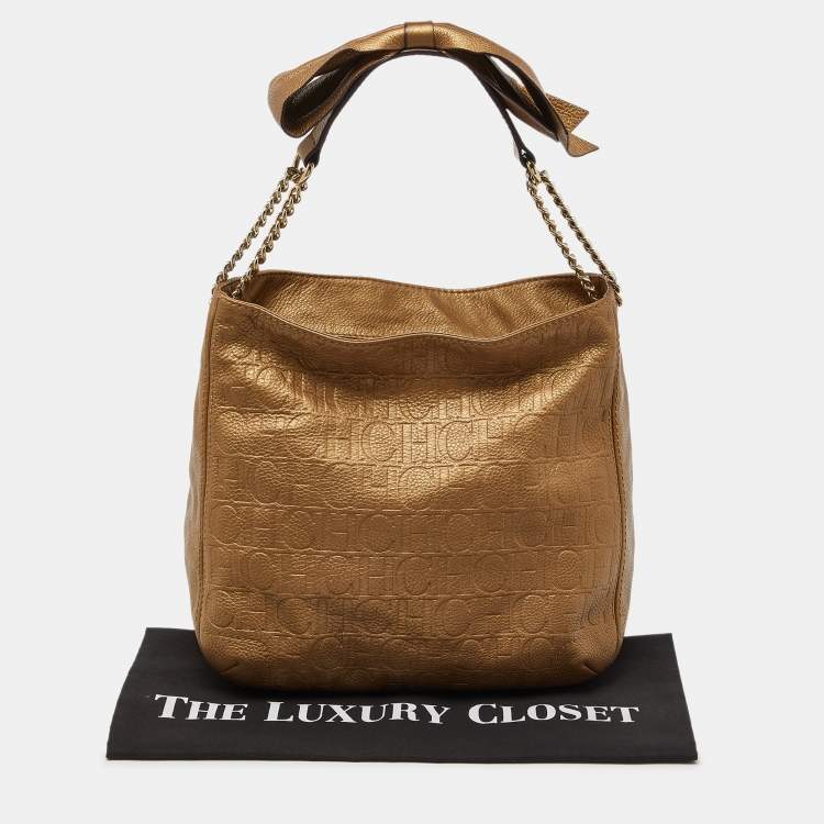 Pre Owned CH Carolina Herrera Gold Monogram Embossed Leather Chain Bow Hobo