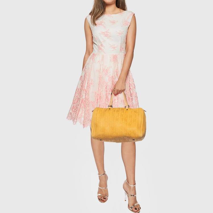 Pre Owned CH Carolina Herrera Mustard Monogram Embossed Leather Large Andy Boston Bag